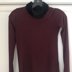 Burgundy fitted Top, zips in back.